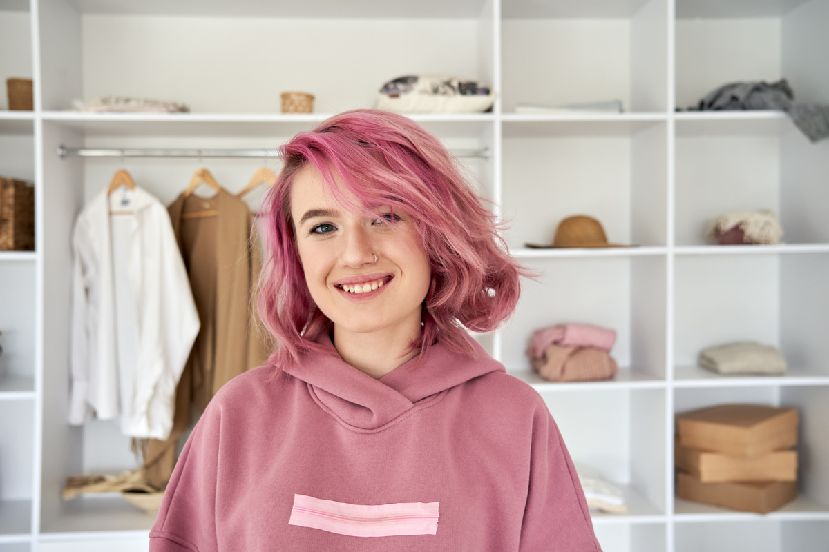 Smiling Hipster Teenage Girl with Pink Hair 